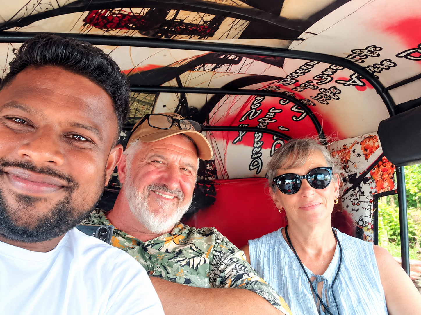 Village tour by tuk -tuk with French couple